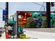 Vibrant mural with seating and string lights that makes a great place to eat at 1418 Oregon St, Orlando, FL 32803