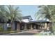 Community amenity center featuring exterior with covered entrance, wooden columns, and black roof at 1461 Santorini Way, Tavares, FL 32778
