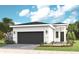 Charming single-story home with a modern design, landscaped yard, and a two-car garage at 1461 Santorini Way, Tavares, FL 32778
