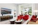 Bright and open living room with large sliding doors and modern decor at 1461 Santorini Way, Tavares, FL 32778