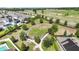 Aerial view of the community dog park offering a fenced in area for the dogs to run and play at 15408 Lebeau Loop, Winter Garden, FL 34787
