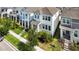 Attractive exterior of the two-story home with well-maintained landscaping, sidewalk, and green grass at 15408 Lebeau Loop, Winter Garden, FL 34787