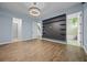 Modern bedroom with a gray accent wall and stylish shelving at 15702 Vetta Dr, Bella Collina, FL 34756