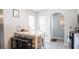 Eat-in kitchen featuring a bar, white countertops and wood-look floors at 16116 Corner Lake Dr, Orlando, FL 32820