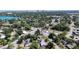 An aerial view of the area showing the tree-lined neighborhood and a glimpse of the lake at 1615 Crestwood Dr, Orlando, FL 32804