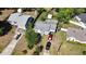 An aerial view of the property including driveway parking, roof, and surrounding homes at 1615 Crestwood Dr, Orlando, FL 32804