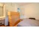 Bright bedroom featuring hardwood floors, a built-in vanity, and storage at 1615 Crestwood Dr, Orlando, FL 32804
