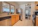 Charming kitchen boasts stainless steel appliances and bright natural light at 1615 Crestwood Dr, Orlando, FL 32804