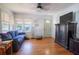Bright living room features hardwood floors, and ample natural light at 1615 Crestwood Dr, Orlando, FL 32804