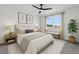 Tranquil bedroom offers a cozy bed, natural light, and minimalist decor at 1773 Groveline Rd, St Cloud, FL 34771