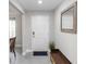 Welcoming entryway with neutral walls and tiled floor leading into a spacious home at 1857 E Cooper Dr, Deltona, FL 32725