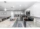 Open kitchen with granite countertops, stainless steel appliances, and ample cabinet space at 1857 E Cooper Dr, Deltona, FL 32725