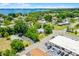 An aerial perspective reveals the property's location in a neighborhood close to a lake, offering a glimpse of waterfront living at 201 W Washington St, Minneola, FL 34715