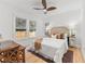 Bedroom with ample natural light, wood floors, and ceiling fan at 205 W Princeton St, Orlando, FL 32804