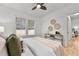 Comfortable bedroom with ceiling fan and view into the hallway at 205 W Princeton St, Orlando, FL 32804