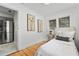 Well-lit bedroom with wood floors, artwork and modern decor at 205 W Princeton St, Orlando, FL 32804