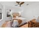 Bedroom with natural light, ceiling fan, hardwood floors, and decorative furniture at 205 W Princeton St, Orlando, FL 32804