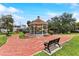 Picturesque gazebo surrounded by landscaped grounds, perfect for relaxation and gatherings at 205 W Princeton St, Orlando, FL 32804