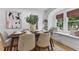 Bright dining room featuring a stylish table setting and natural light from the window seat at 205 W Princeton St, Orlando, FL 32804