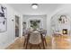 Elegant dining room with hardwood floors, stylish furniture, and natural light at 205 W Princeton St, Orlando, FL 32804
