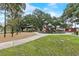 Well maintained community playground area in a grassy and shaded setting at 205 W Princeton St, Orlando, FL 32804