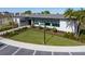 Modern community center with beautiful landscaping, providing residents with a place to gather, relax, and socialize at 2095 Heart Lake Dr, Groveland, FL 34736