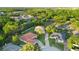 Aerial view showcasing a neighborhood, featuring lush greenery and diverse architecture at 215 Juniper Ridge Ct, Sanford, FL 32771