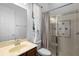 Bathroom with vanity, mirror, and a tiled shower at 215 Juniper Ridge Ct, Sanford, FL 32771