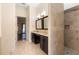 Bathroom featuring granite countertop vanity, tiled walk-in shower and marble floors at 215 Juniper Ridge Ct, Sanford, FL 32771