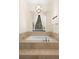 Bathroom featuring a soaking tub with tile surround and modern lighting at 215 Juniper Ridge Ct, Sanford, FL 32771