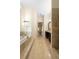 Bathroom showcasing a tub, vanity, tiled walk-in shower and marble floors at 215 Juniper Ridge Ct, Sanford, FL 32771