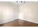 Bedroom with hardwood floors, ceiling fan, and closet at 215 Juniper Ridge Ct, Sanford, FL 32771