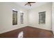 Bright bedroom with hardwood floors and lots of windows at 215 Juniper Ridge Ct, Sanford, FL 32771