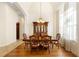 Formal dining room with tall ceilings, chandelier, wood floors, and bright natural light at 215 Juniper Ridge Ct, Sanford, FL 32771