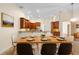 Inviting dining space open to the kitchen, perfect for entertaining guests at 215 Juniper Ridge Ct, Sanford, FL 32771