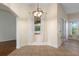 Dining area with decorative light fixture and backyard views at 215 Juniper Ridge Ct, Sanford, FL 32771