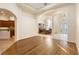 Open-concept interior showcasing hardwood floors and seamless transitions between living spaces at 215 Juniper Ridge Ct, Sanford, FL 32771