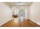 Hardwood floors throughout the open floor plan that connects living and dining areas at 215 Juniper Ridge Ct, Sanford, FL 32771