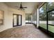 Spacious screened-in patio with brick flooring at 215 Juniper Ridge Ct, Sanford, FL 32771