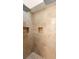 Detailed view of the tiled walk-in shower with stone accents and dual shower heads at 215 Juniper Ridge Ct, Sanford, FL 32771