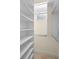 Walk-in closet with white shelving, a window and tile flooring at 215 Juniper Ridge Ct, Sanford, FL 32771