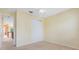 Cozy bedroom featuring neutral walls, carpet floors, a ceiling fan and a closet with sliding doors at 2153 Cypress Villas Dr, Orlando, FL 32825