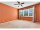 Cozy bedroom with natural light and neutral colored carpet at 2153 Cypress Villas Dr, Orlando, FL 32825