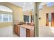 Open-concept kitchen featuring a breakfast bar with dark wood cabinets at 2153 Cypress Villas Dr, Orlando, FL 32825