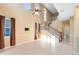 Bright and airy living room boasting high ceilings, a staircase, and plenty of natural light at 2153 Cypress Villas Dr, Orlando, FL 32825