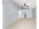 Large bedroom with tile floors, light-gray walls, and plenty of space at 2511 Brookstone Dr, Kissimmee, FL 34744