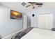 Bright bedroom features a ceiling fan and large closet at 2511 Brookstone Dr, Kissimmee, FL 34744