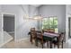 Cozy dining area with modern lighting and seating for six at 2511 Brookstone Dr, Kissimmee, FL 34744