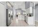 Well-lit kitchen with modern stainless steel appliances and updated countertops at 2511 Brookstone Dr, Kissimmee, FL 34744