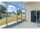 Large lanai leading to a spacious backyard at 2511 Brookstone Dr, Kissimmee, FL 34744